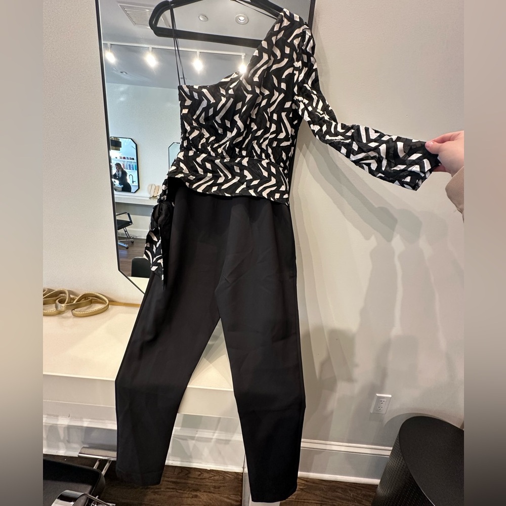 Adelyn Rae strip jumpsuit